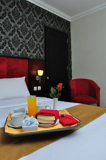 Feodora Airport Hotel Palimbão Quarto foto