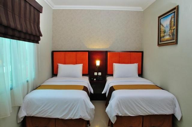 Feodora Airport Hotel Palimbão Quarto foto