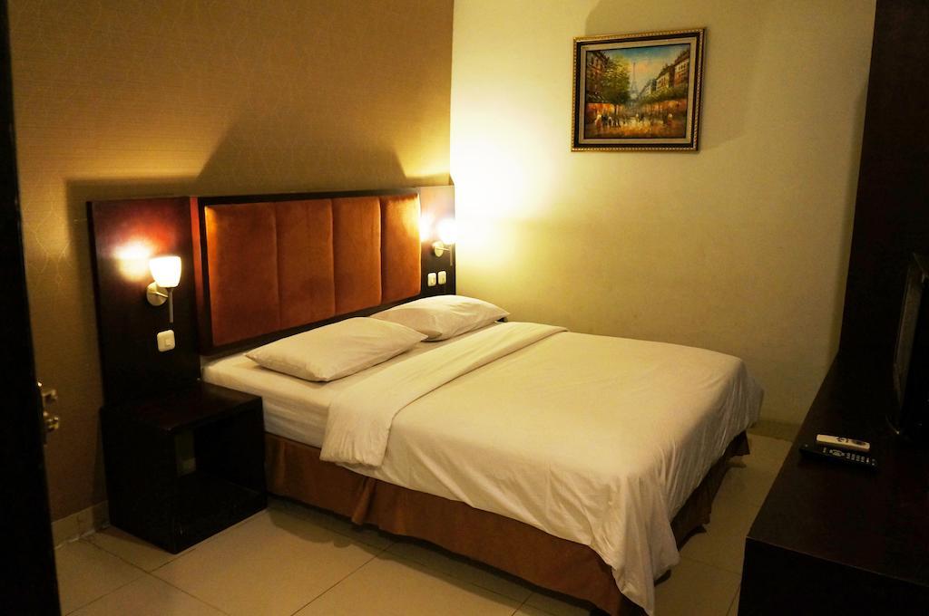 Feodora Airport Hotel Palimbão Quarto foto