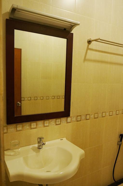 Feodora Airport Hotel Palimbão Quarto foto