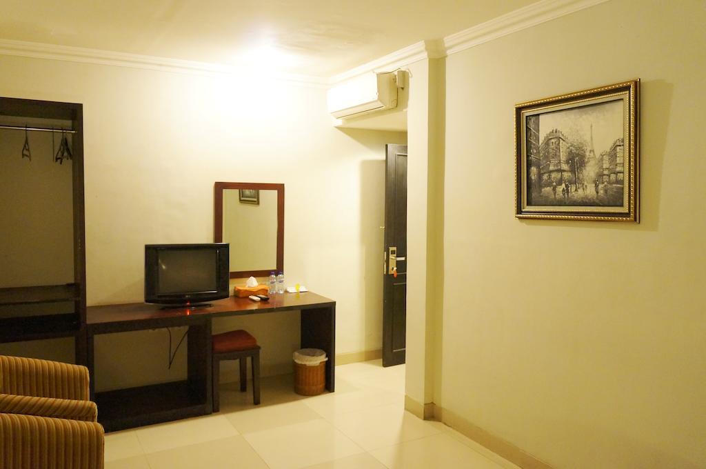 Feodora Airport Hotel Palimbão Quarto foto