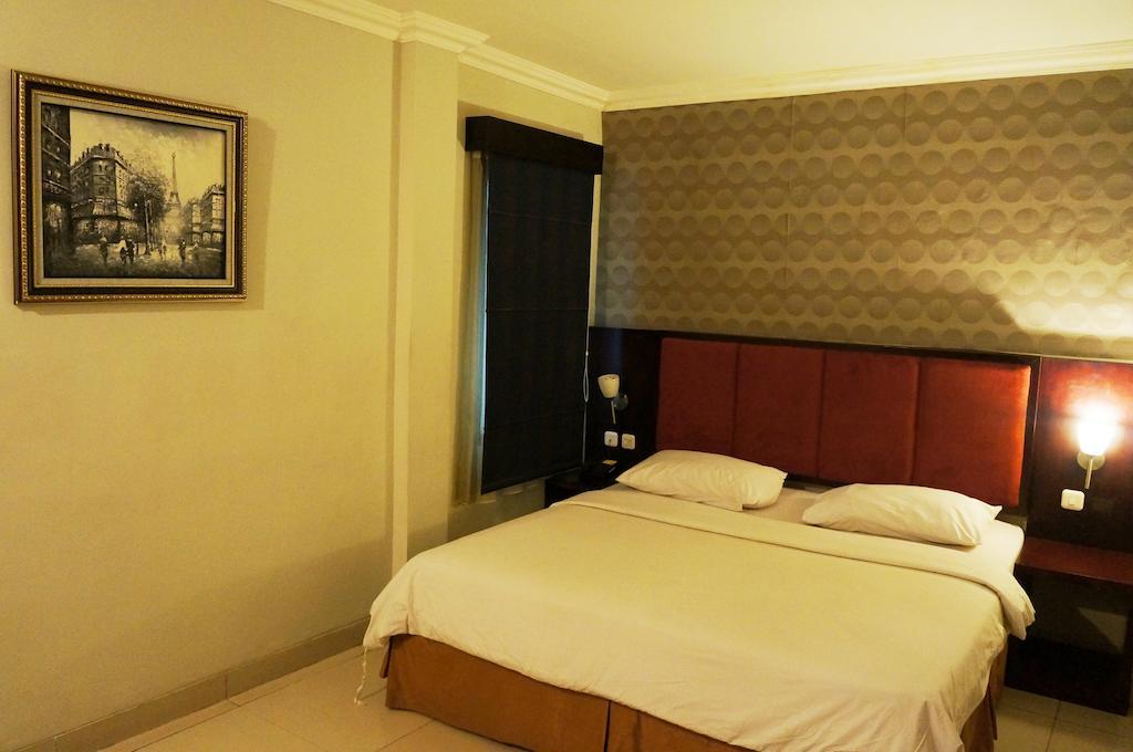Feodora Airport Hotel Palimbão Quarto foto